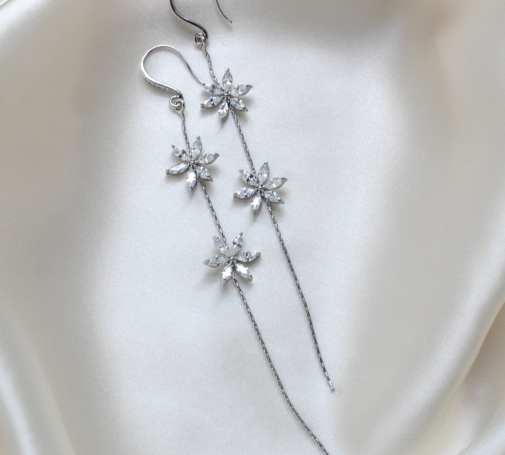 Long thin gold earrings with simulated diamond flowers - RAELYNN - Treasures by Agnes