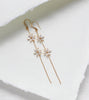 Long thin gold earrings with simulated diamond flowers - RAELYNN - Treasures by Agnes