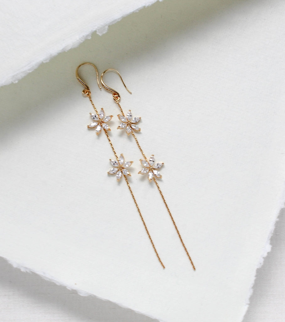 Long thin gold earrings with simulated diamond flowers - RAELYNN - Treasures by Agnes