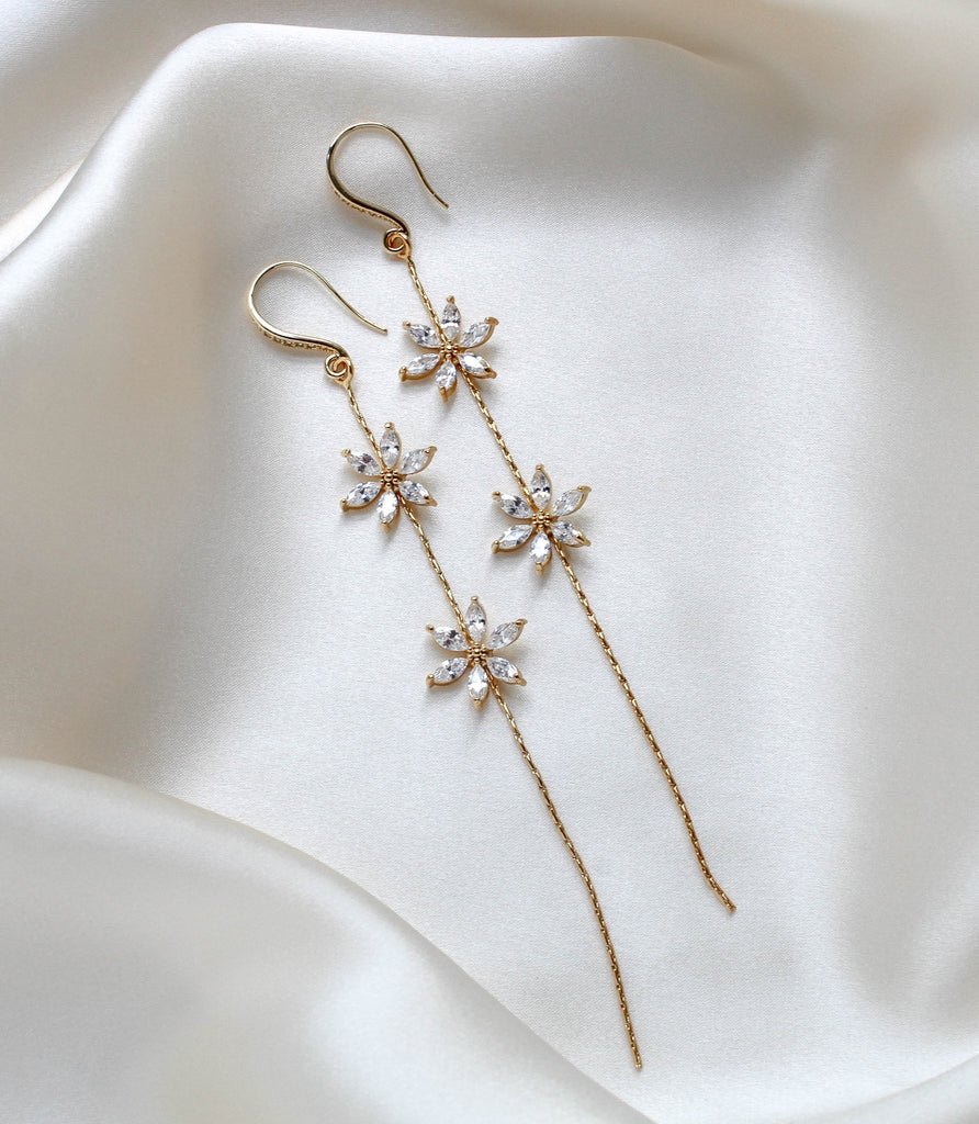 Long thin gold earrings with simulated diamond flowers - RAELYNN - Treasures by Agnes