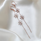 Long thin gold earrings with simulated diamond flowers - RAELYNN - Treasures by Agnes