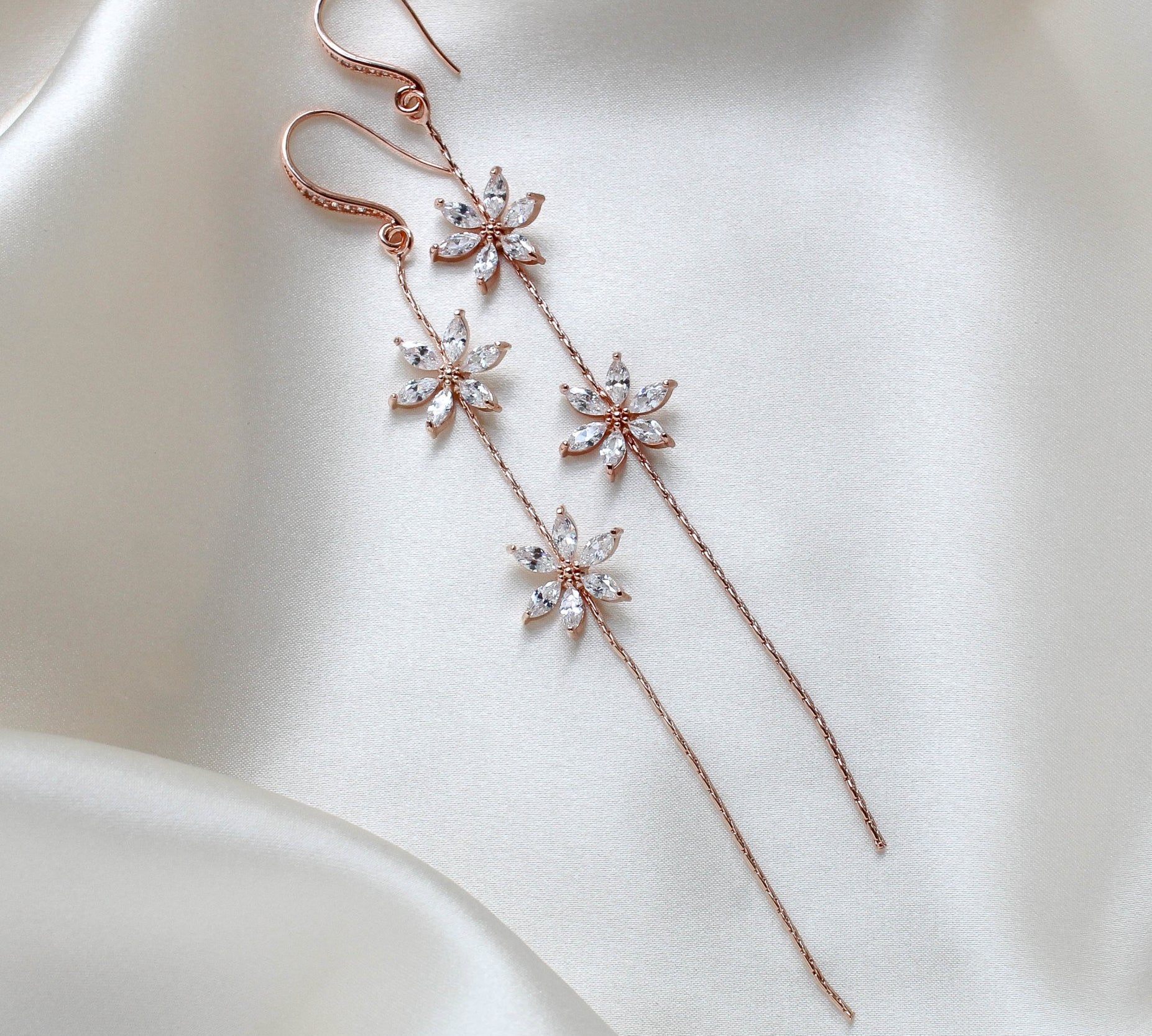 Long thin gold earrings with simulated diamond flowers - RAELYNN - Treasures by Agnes