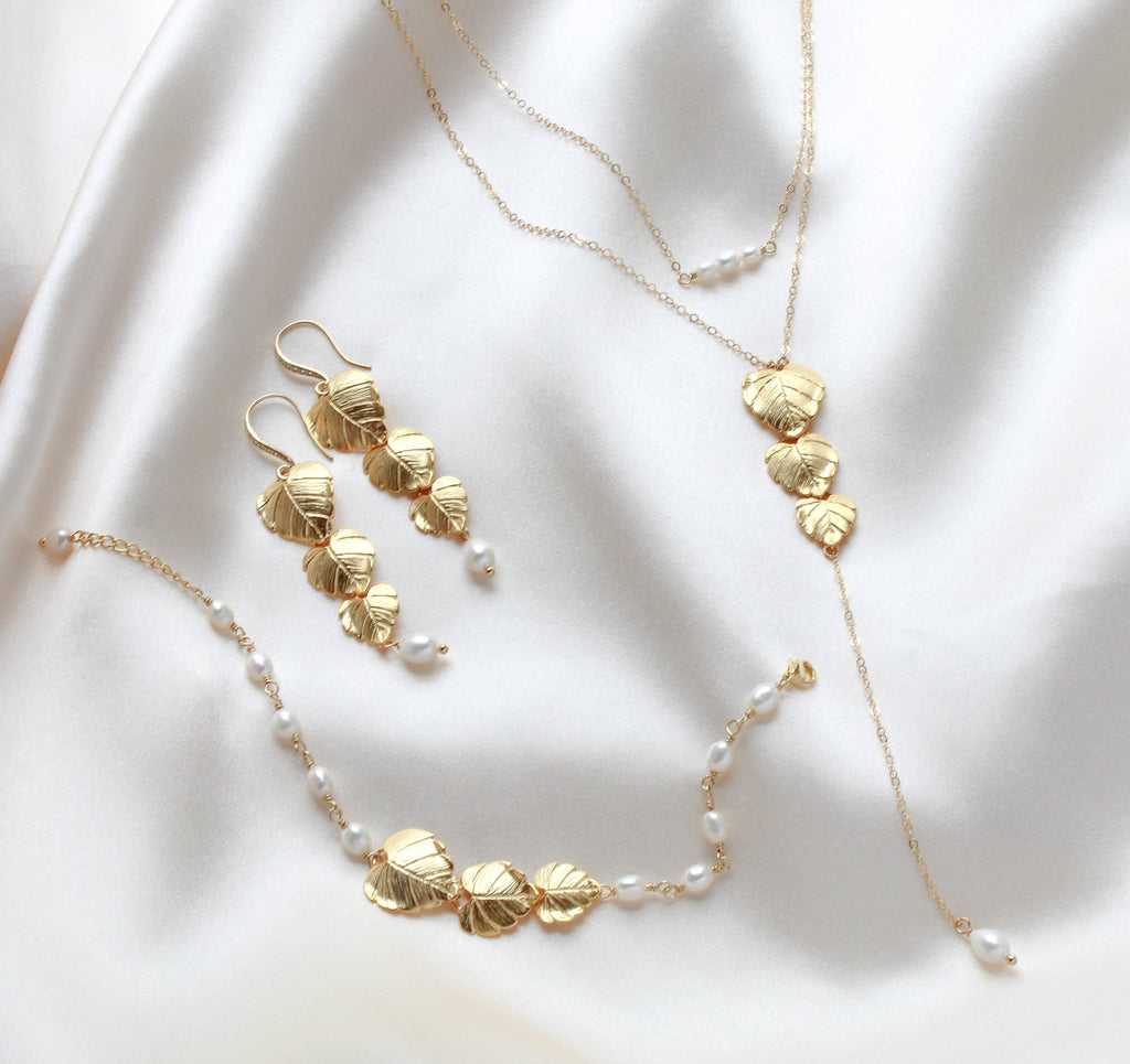 Long gold pearl earrings with cascading leaves - DELANEY - Treasures by Agnes