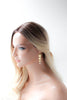 Long gold pearl earrings with cascading leaves - DELANEY - Treasures by Agnes